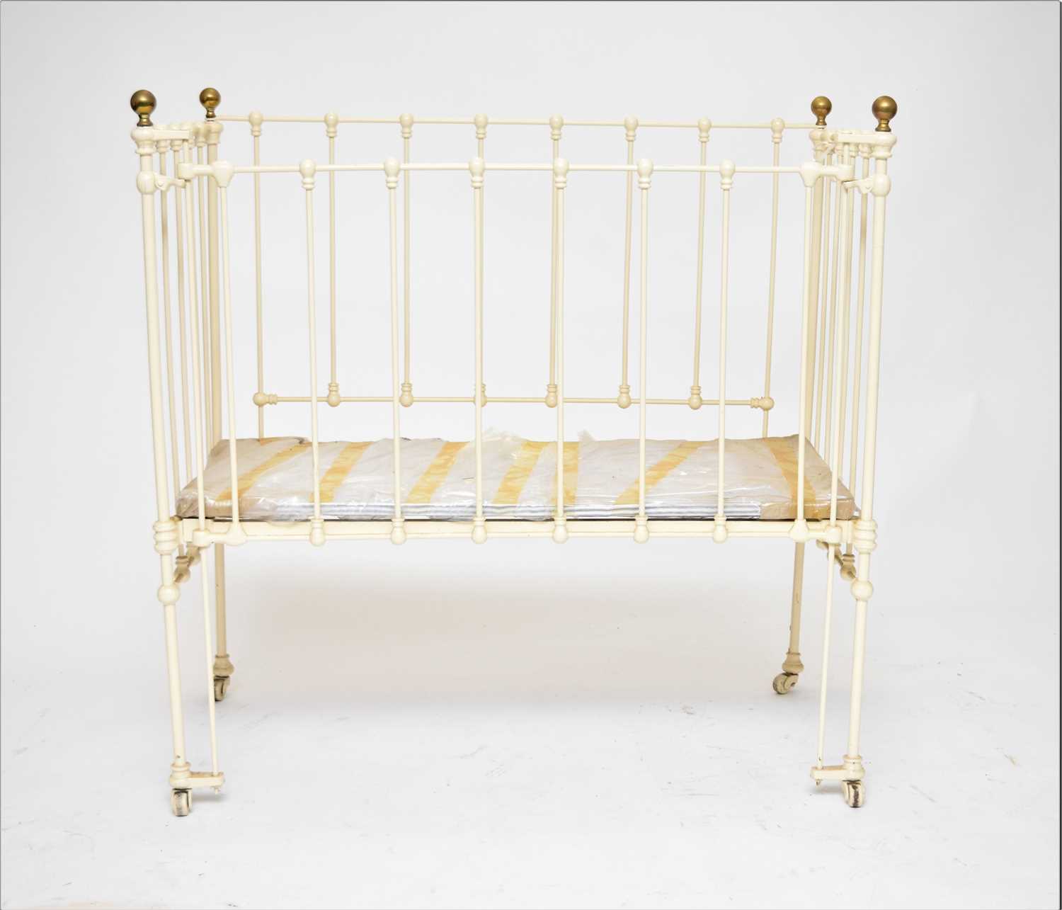 Lot 430 - A late Victorian painted iron and brass cot by Seventh Heaven