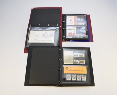 Lot 175 - Stamp collection in two cardboard boxes: three albums of GB FDCs and mint and used stamps.