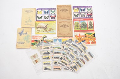Lot 322 - A large collection of cigarette cards to albums and some loose