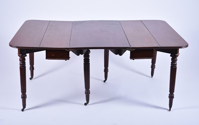 Lot 442 - A Regency mahogany extending dining table with scissor-action