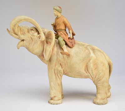 Lot 200 - A Royal Dux style elephant, ridden by a mahout