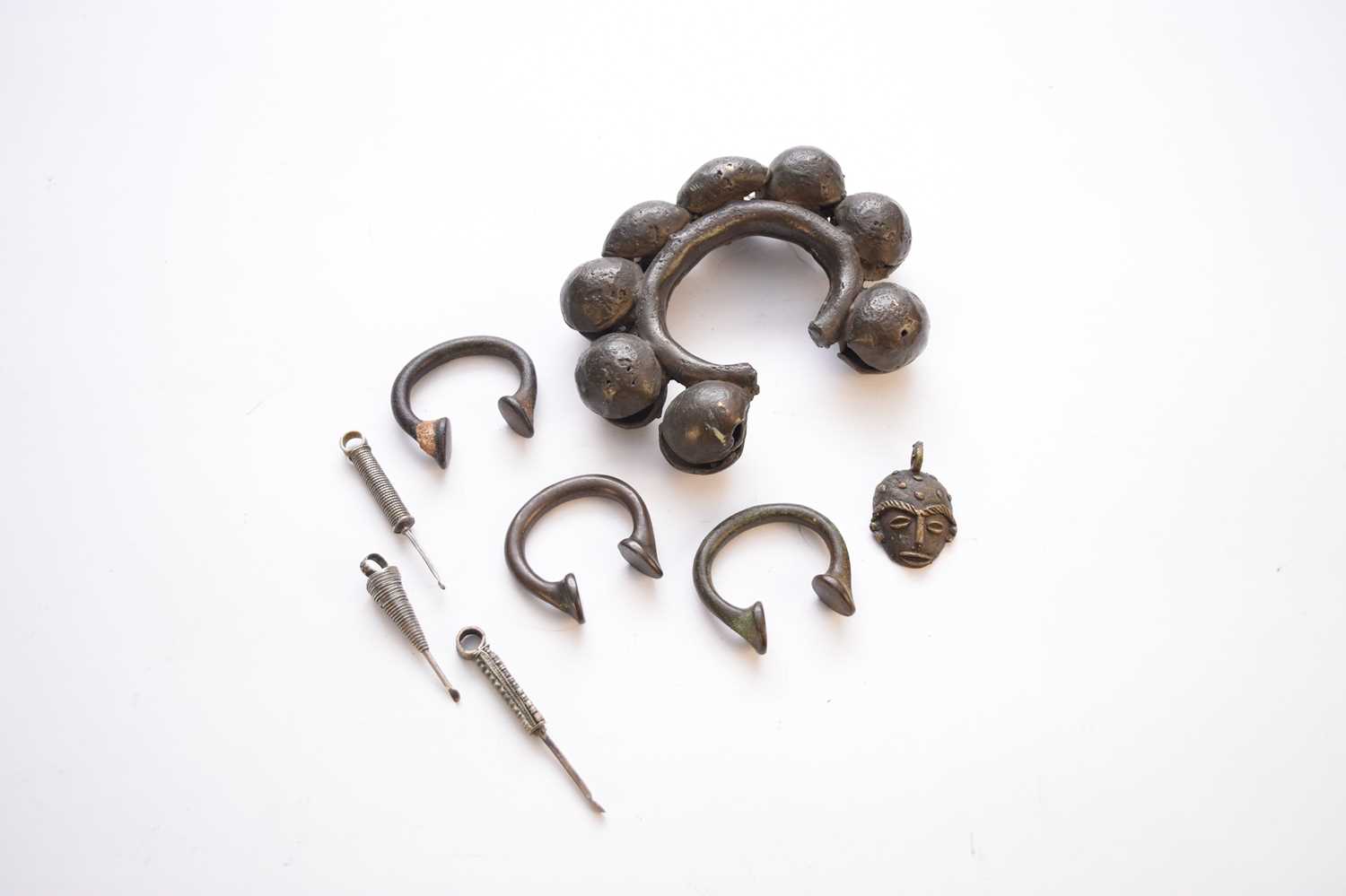 Lot 314 - An assembled group of African tribal metalwares