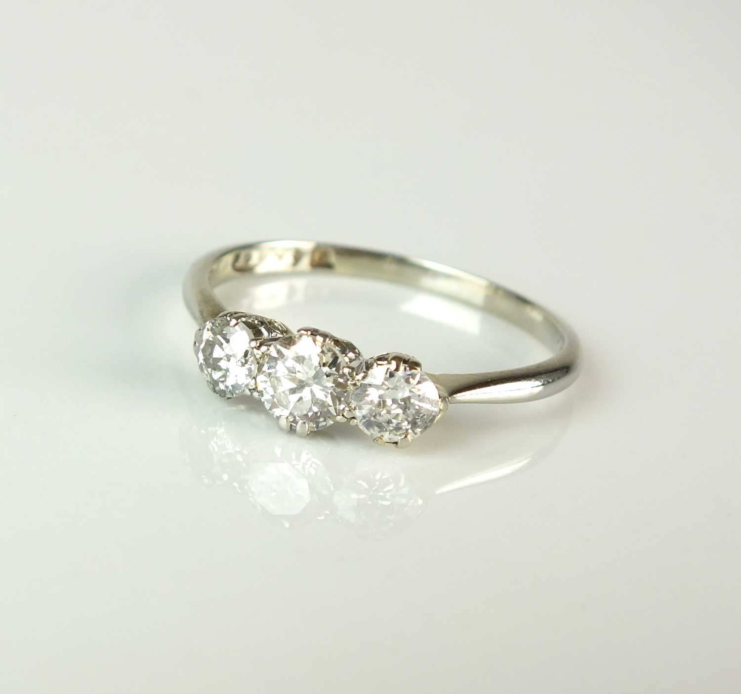 Lot 55 - A graduated three stone diamond ring