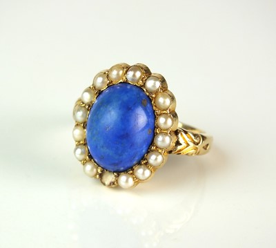 Lot 87 - A late 19th century 18ct gold lapis lazuli and split seed pearl cluster ring