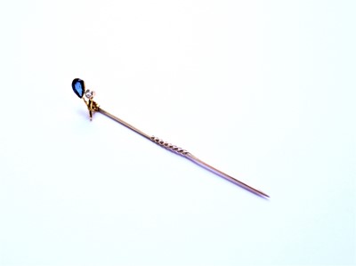 Lot 54 - An early 20th century sapphire and diamond stick pin