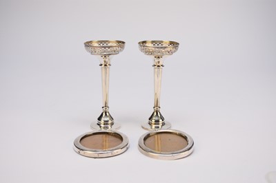 Lot 15 - A pair of early 20th century silver mounted posy vases and a pair of silver mounted frames
