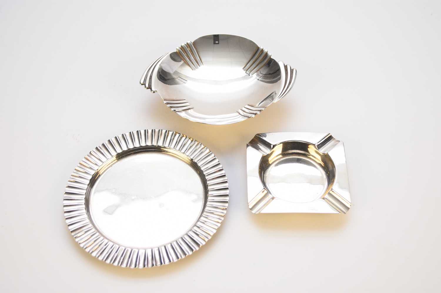 Lot 16 - Two silver dishes and a silver ash tray