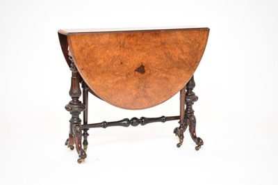 Lot 566 - A Victorian walnut Sutherland table