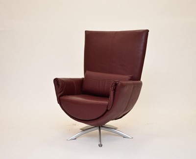 Lot 576 - A modern Scandinavian leather and aluminium armchair