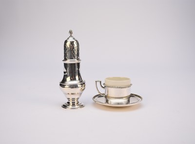 Lot 33 - A George III silver caster and a silver cup and saucer