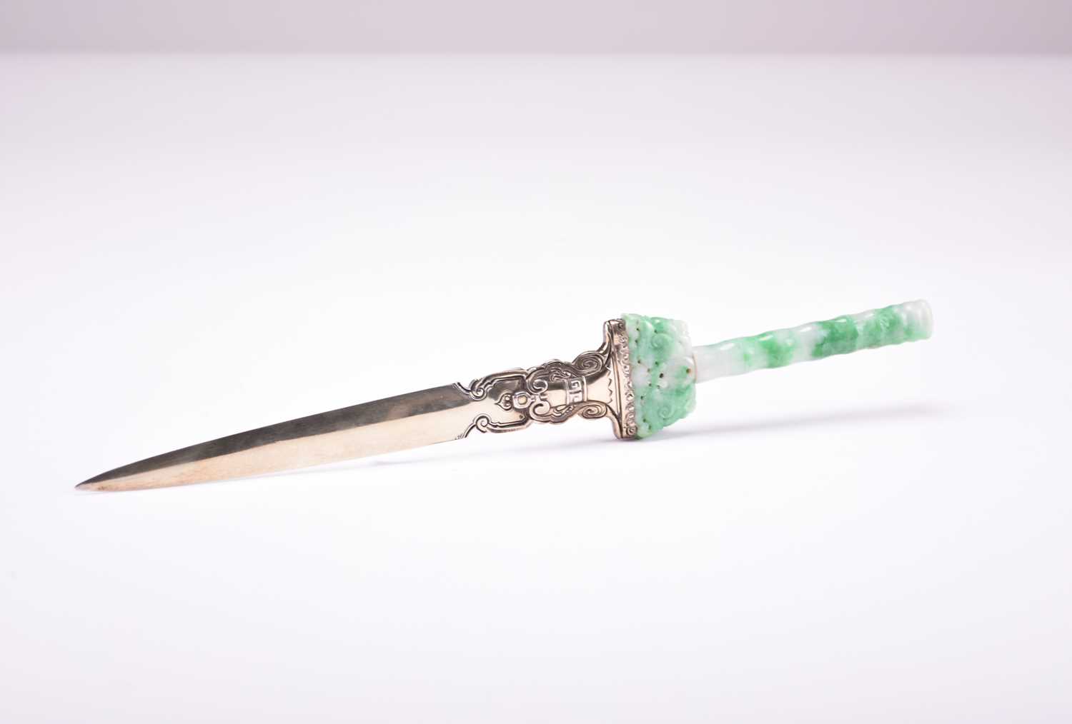 Lot 537 - A Chinese jade-handled silver letter opener