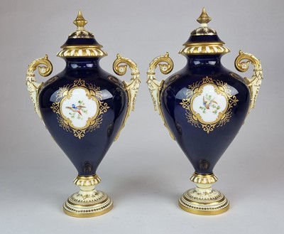 Lot 207 - A pair of Coalport vases and covers