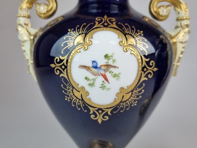 Lot 207 - A pair of Coalport vases and covers