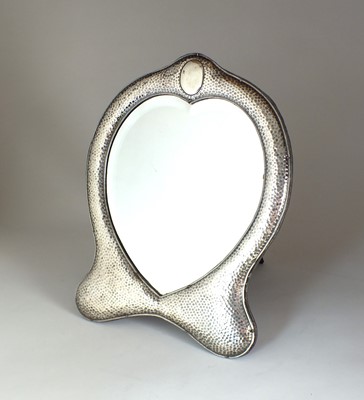 Lot 8 - An Edwardian silver mounted heart shaped mirror