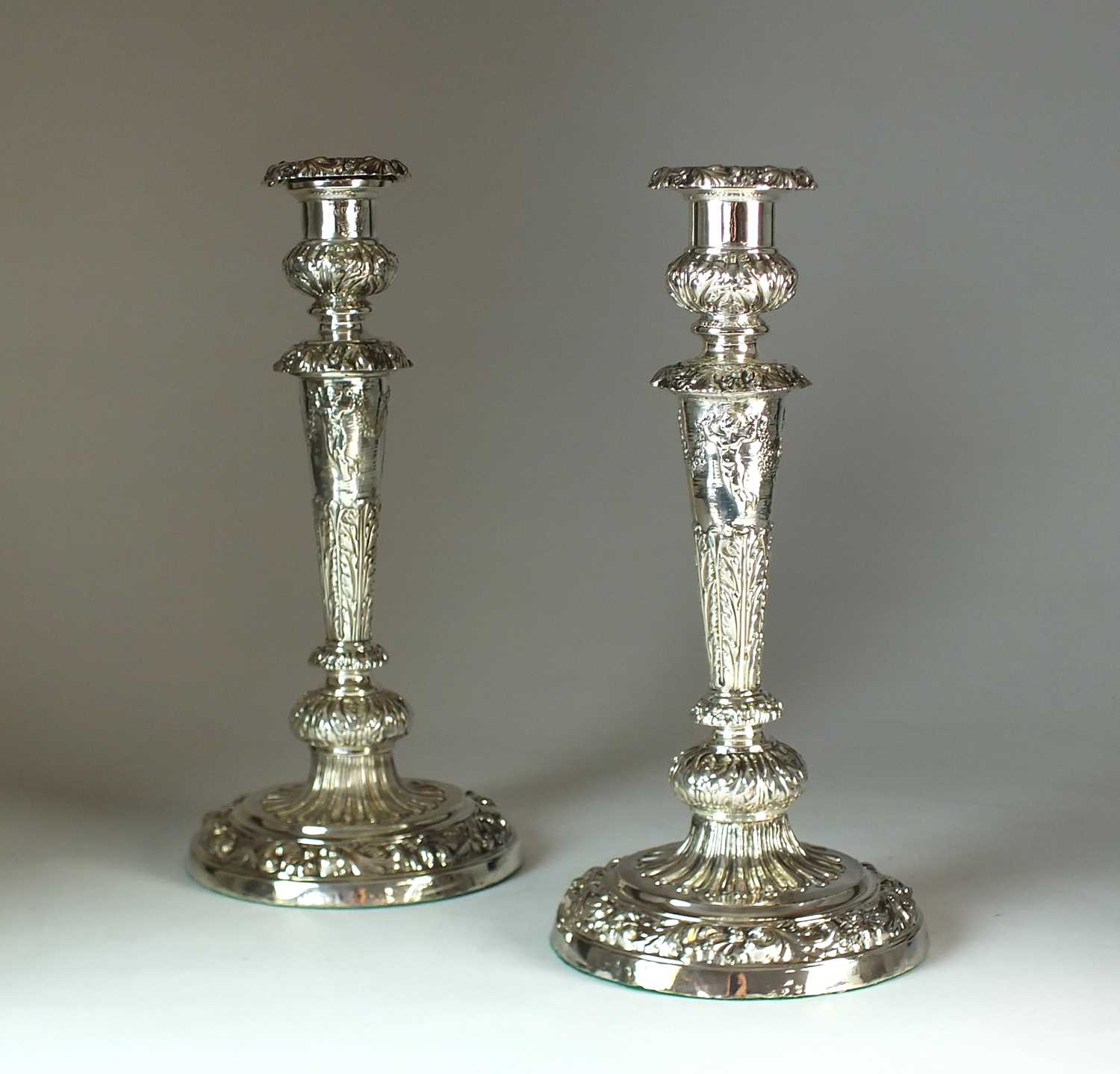 Lot 7 - A pair of George III silver mounted candlesticks