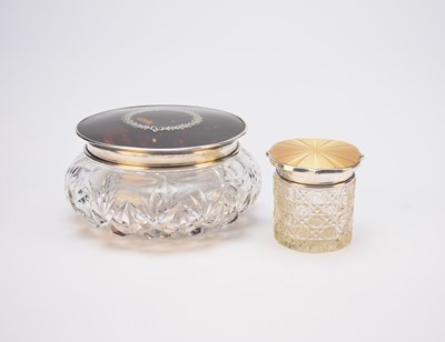 Lot 36 - Two silver topped dressing table jars