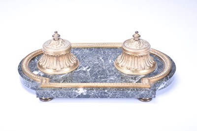 Lot 515 - An ormolu and grey-veined marble desk stand