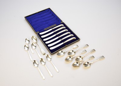 Lot 28 - A collection of silver spoons and a cased set of silver handled knives