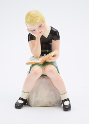 Lot 263 - A Goldscheider figure of a girl reading a book after Claire Weiss