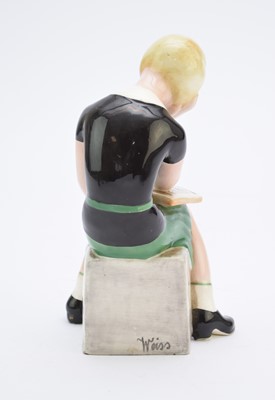Lot 263 - A Goldscheider figure of a girl reading a book after Claire Weiss