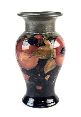 Lot 268 - William Moorcroft 'Pomegranate' vase with pewter mount, circa 1920s