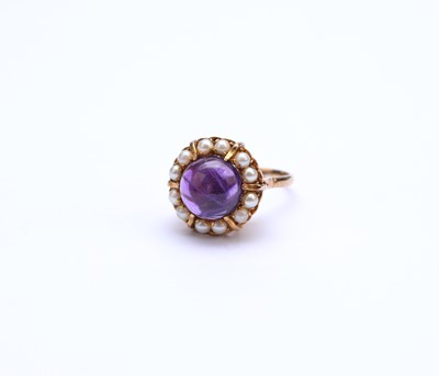 Lot 87 - A 9ct gold amethyst and pearl cluster ring