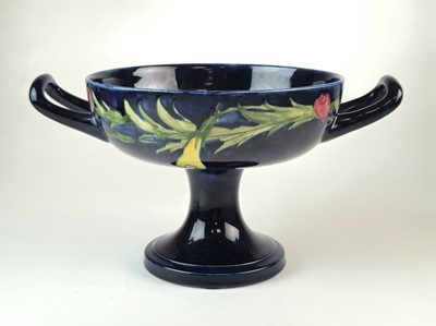 Lot William Moorcroft twin-handled 'Pansy' tazza