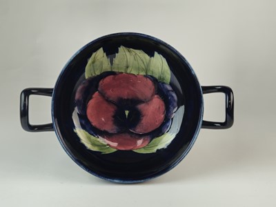 Lot William Moorcroft twin-handled 'Pansy' tazza