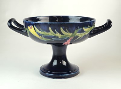 Lot William Moorcroft twin-handled 'Pansy' tazza