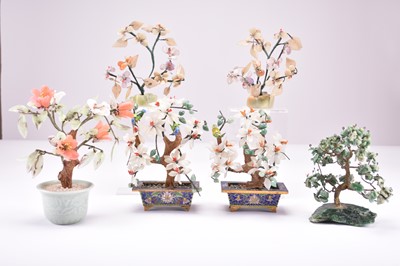 Lot 481 - A collection of six Chinese hardstone models of trees