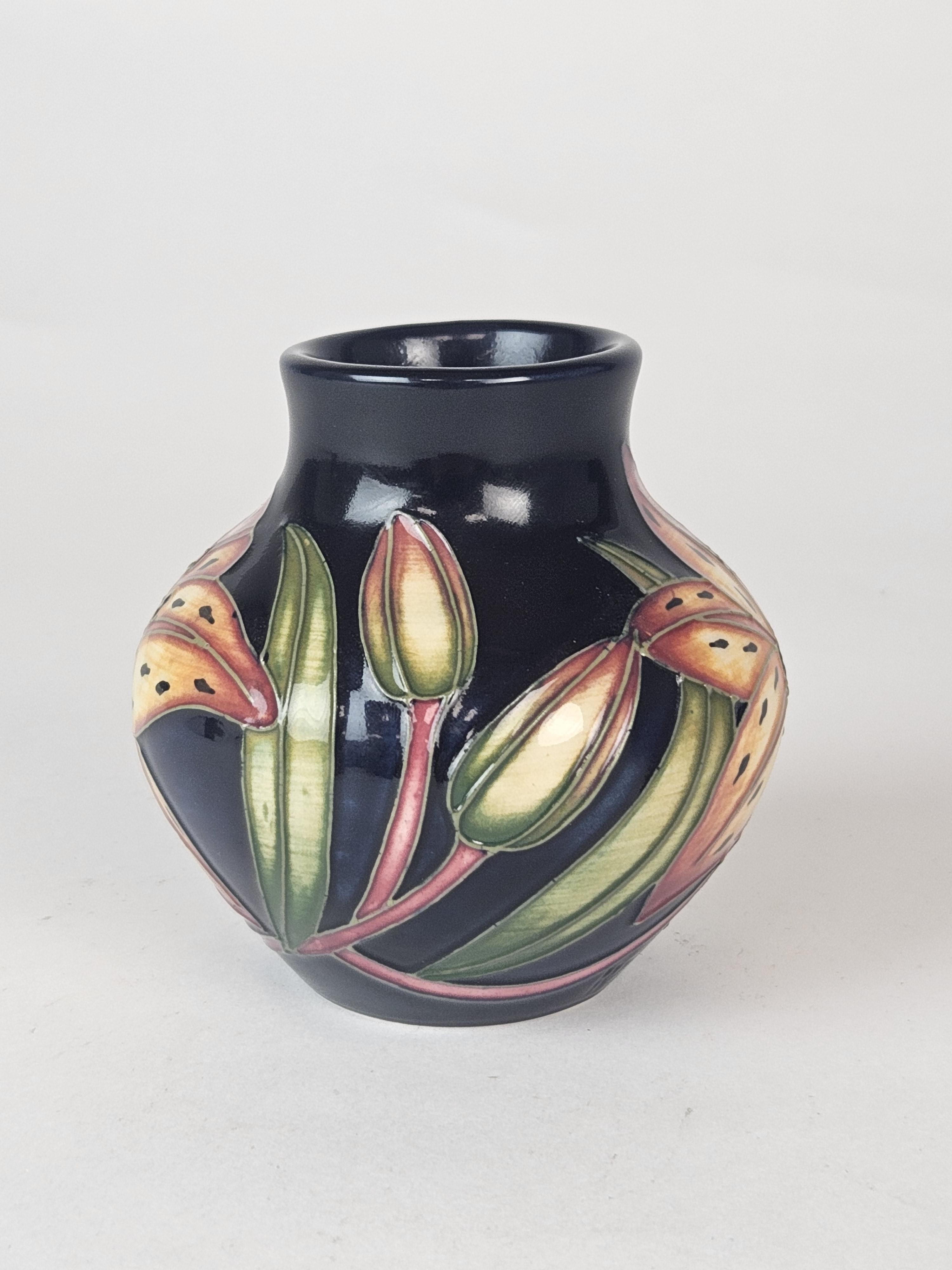 Lot 248 Small Moorcroft 'Tigris Lily' vase