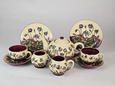 Lot Moorcroft 'Ashwood Hepatica' service, rare colourway