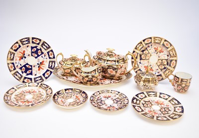 Lot 214 - An assembled Royal Crown Derby imari service, pattern 2451