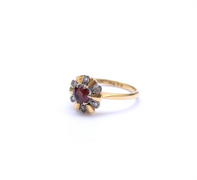 Lot 88 - A garnet and diamond cluster ring