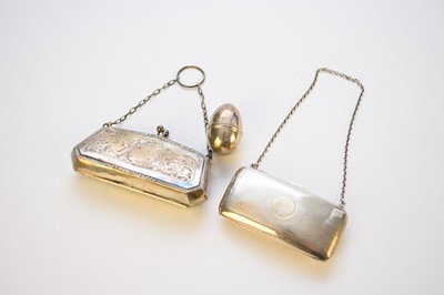 Lot 36 - A silver nutmeg grater and two silver purses