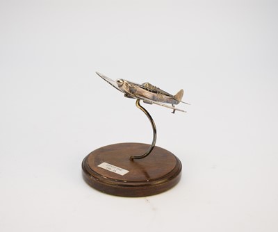 Lot 43 - A silver model of a Spitfire