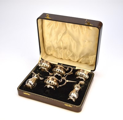 Lot 47 - A cased set of George III style silver cruets