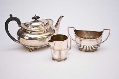 Lot 54 - A Victorian silver teapot, cream jug and sugar bowl