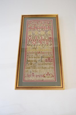 Lot 413 - A framed 18th century needlework sampler, dated 1769