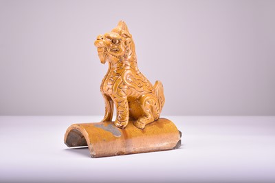Lot 508 - A Chinese sancai glazed teracotta roof tile modelled as a Pixiu