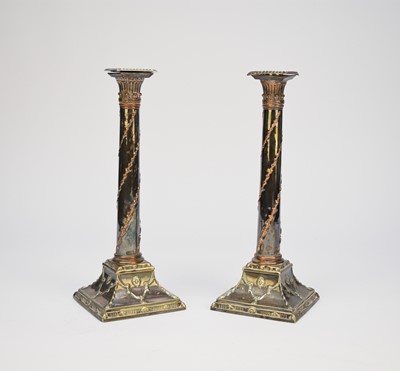 Lot 58 - A pair of silver plated candlesticks