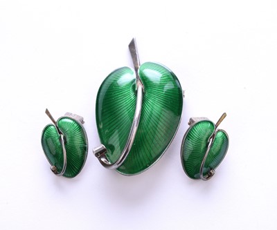 Lot 84 - A Danish silver and enamel brooch and earrings suite by Volmer Bahner