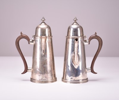 Lot 22 - A George V Queen Anne style silver coffee pot and hot water jug