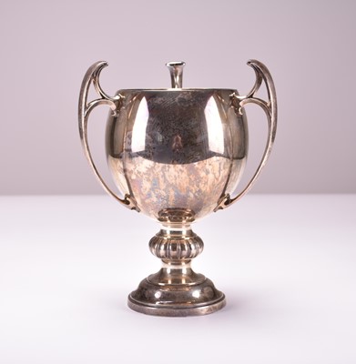 Lot 1 - A three handled silver cup