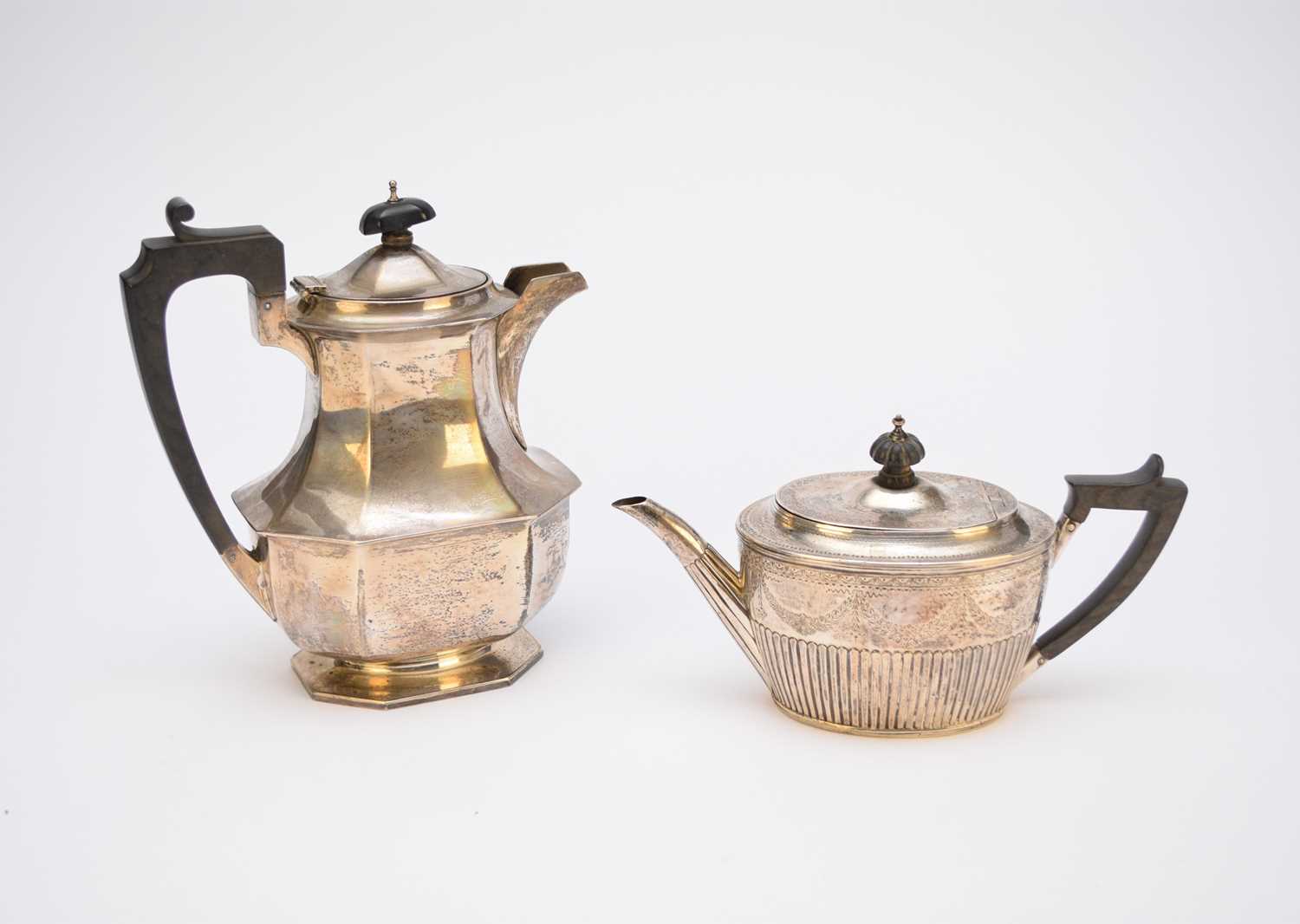 Lot 4 - A Victorian silver teapot and a George V silver hot water jug