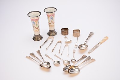 Lot 8 - A collection of silver flatware, napkin rings and a pair of vases