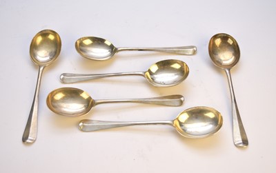 Lot 60 - A set of six silver rat tail soup spoons