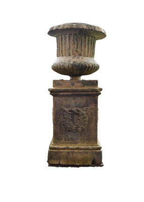 Lot 480 - A pair of late Victorian cast stone garden urns