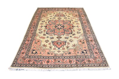 Lot 581 - A Heriz rug, North West Persia