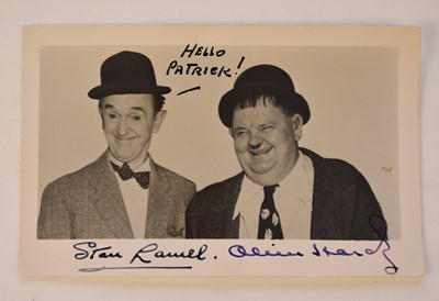 Lot 1045 - LAUREL & HARDY, Postcard signed by Stan Laurel (1890-1965) and Oliver Hardy (1892-1957)